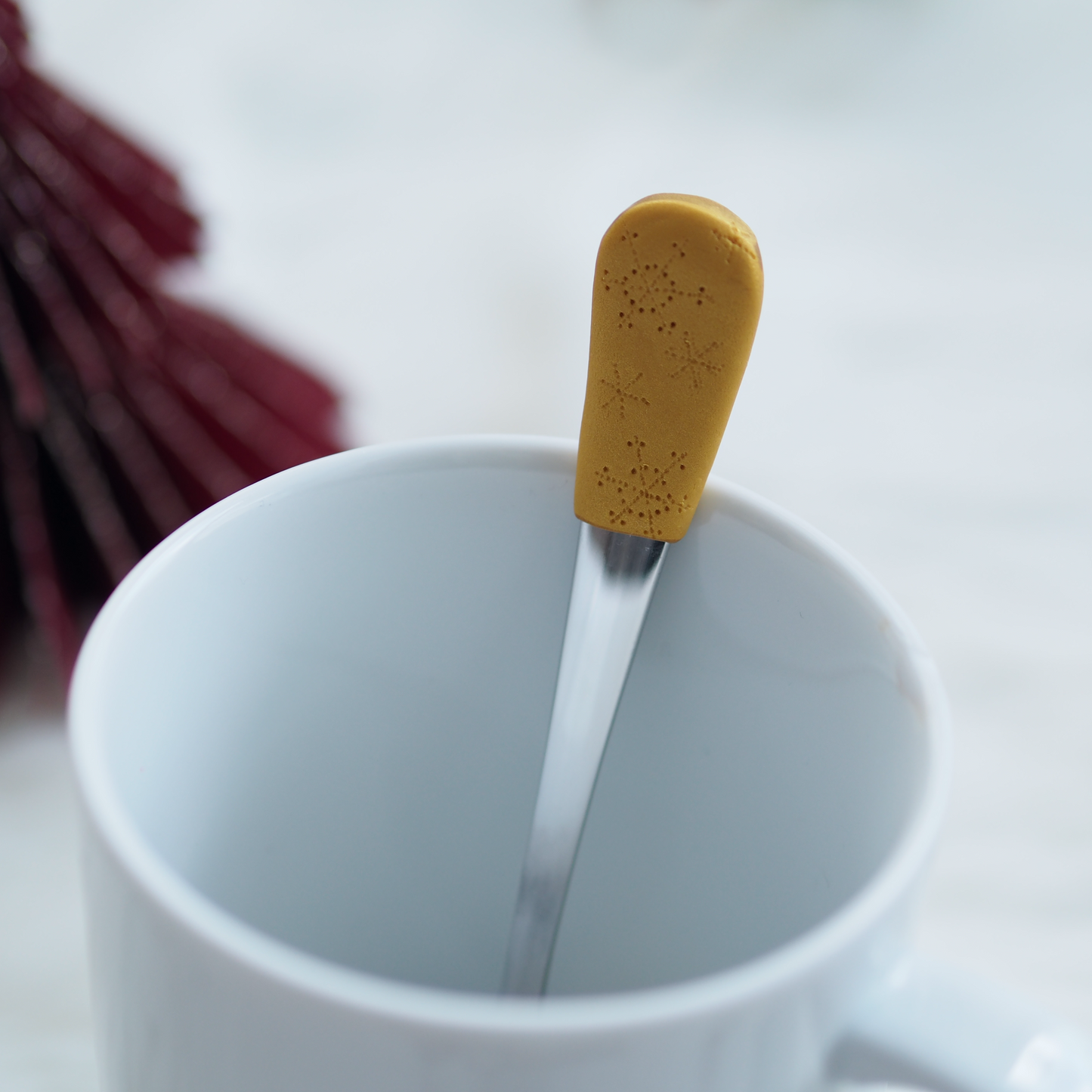 Kávová lžička s motivem ražených sněhových vloček